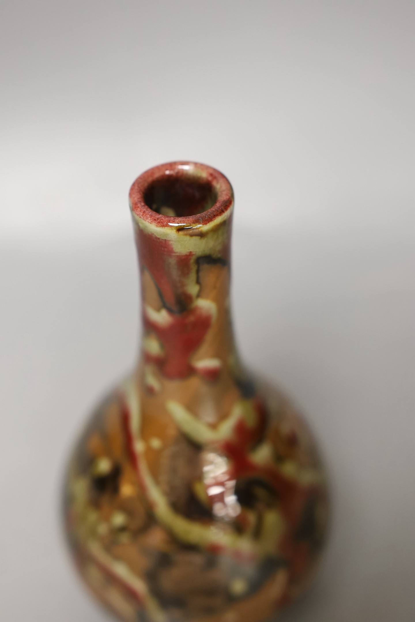 A Chinese flambé glazed vase-18 cms high.